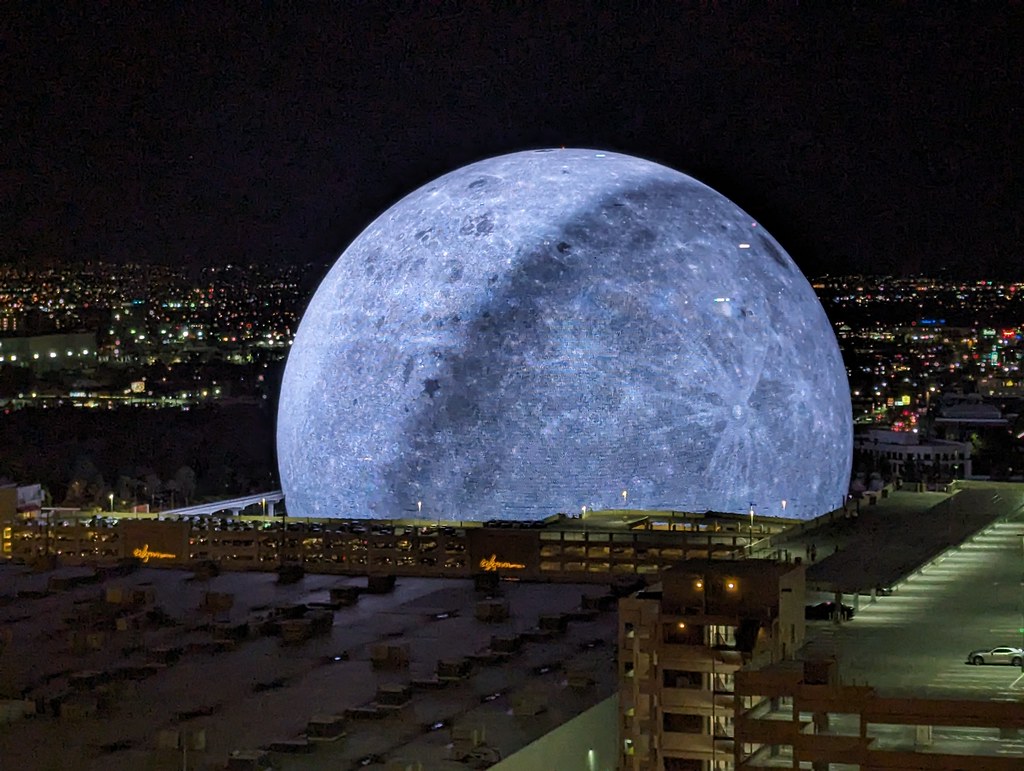 The+sphere+lights+up+Las+Vegas+with+its+moon+projection.+Image+courtesy+of+Flickr.