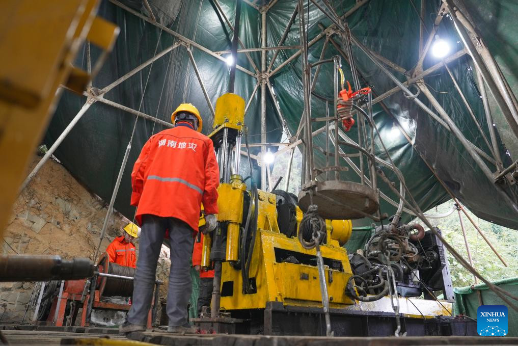 Chinese gold miners working at the Wangu gold field.